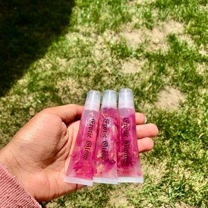 Rose infused lip glosses